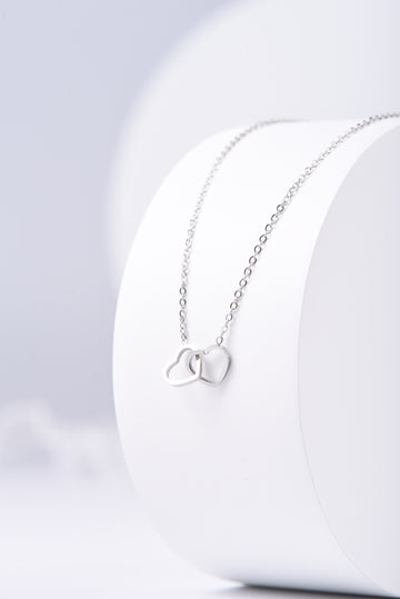 Intertwined Heart Necklace in Silver