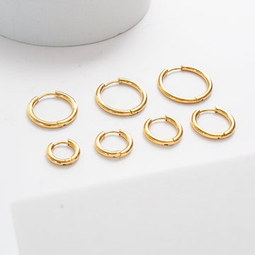 Thick Hoop Earrings in Gold